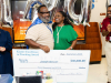 Representatives of the Kinder Foundation recognize teacher Joseph Stewart of Aldine ISD’s Plummer Middle School with the Kinder Excellence in Teaching Award.