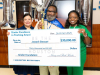 Representatives of the Kinder Foundation recognize teacher Joseph Stewart of Aldine ISD’s Plummer Middle School with the Kinder Excellence in Teaching Award.