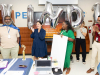 Representatives of the Kinder Foundation recognize teacher Joseph Stewart of Aldine ISD’s Plummer Middle School with the Kinder Excellence in Teaching Award.